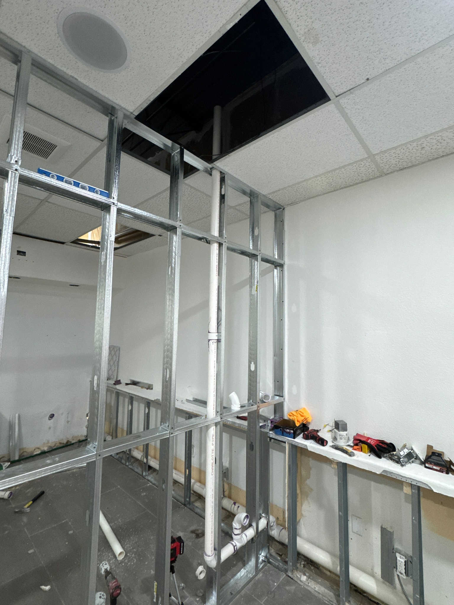 Framing and plumbing rough-in behind walls